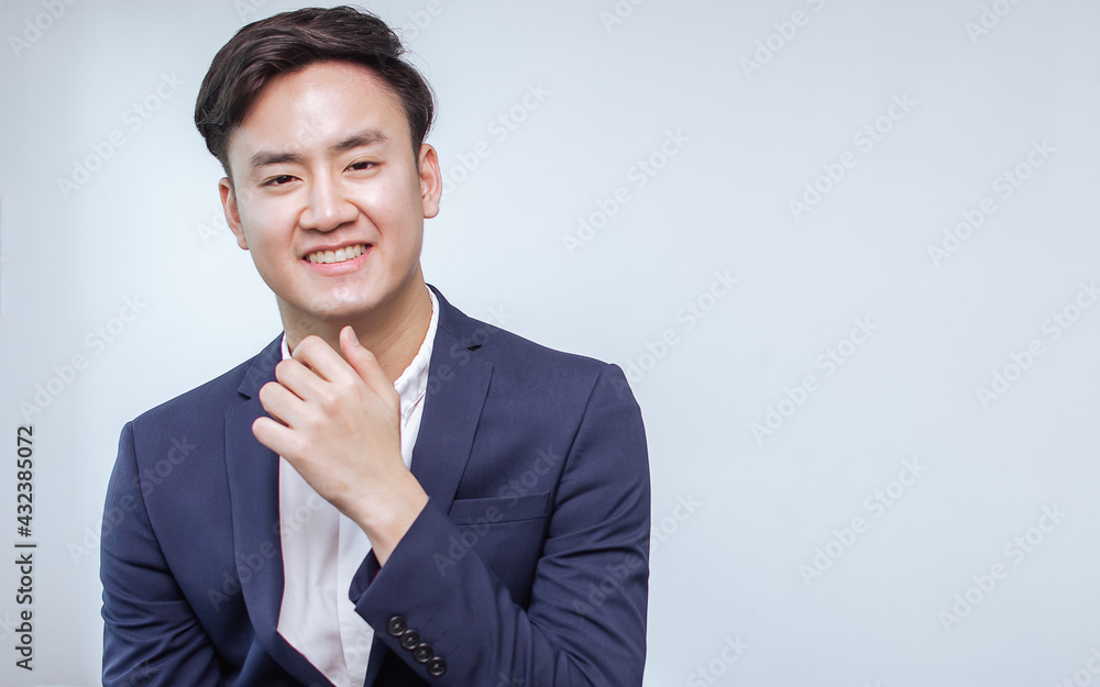 Portrait of Asian handsome business man wearing formal suit, cross his arms and smiling with confident with white background. Portrait of Asian handsome business man wearing formal suit, cross his arms and smiling with confident with white background.