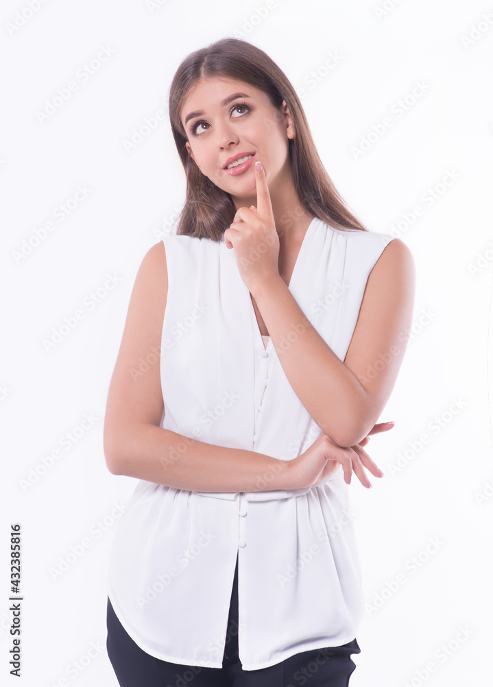 Beautiful business girl thinking with a smile on her face.Vertical photography Beautiful business girl thinking with a smile on her face.Vertical photography