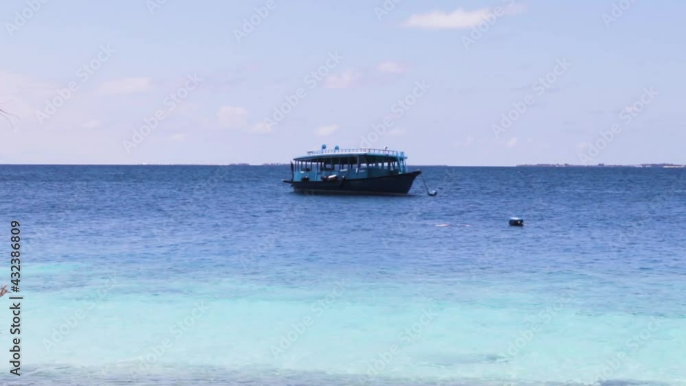Fihalholi island, Maldives 04.24.2021 - Boat swaying on the waves. Holidays Fihalholi island, Maldives 04.24.2021 - Boat swaying on the waves. Holidays