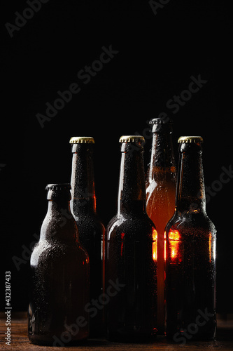 alcoholic drinks, beer with foam isolated on black background..