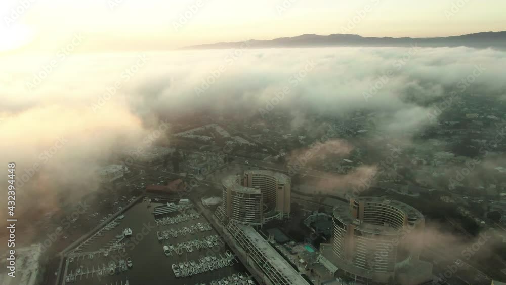 Aerial Panning Shot Of Clouds Over Marina Del Rey In City Against Sky, Drone Flying Over Harbor At Sunset - Los Angeles, California Aerial Panning Shot Of Clouds Over Marina Del Rey In City Against Sky, Drone Flying Over Harbor At Sunset - Los Angeles, California