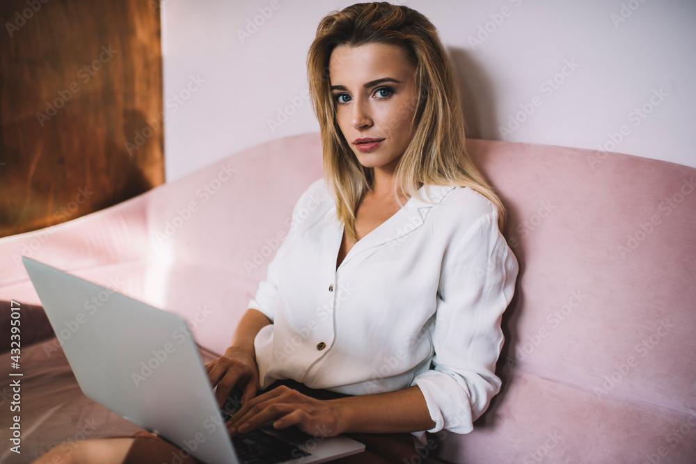 Content young woman working on laptop Content young woman working on laptop