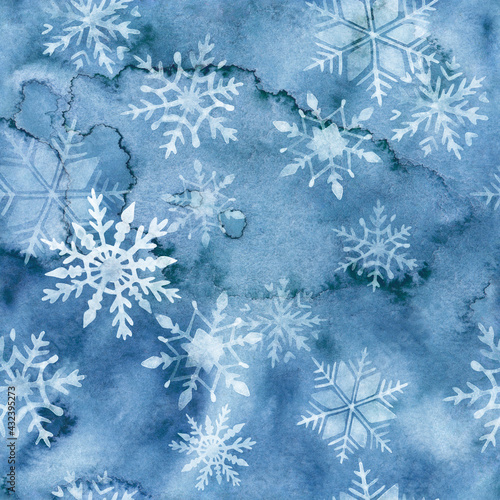 Hand drawn watercolor seamless pattern with snowflakes in blue colors.