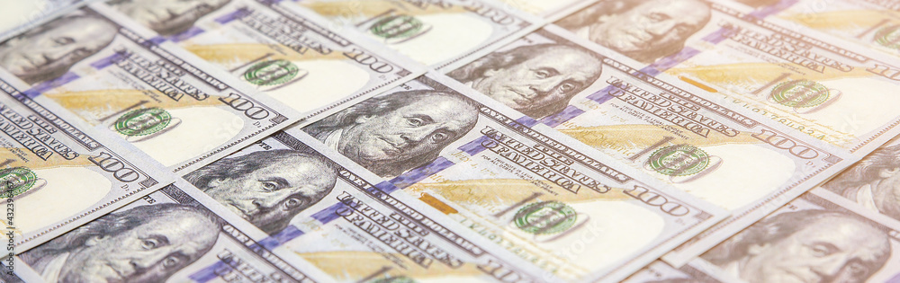 A lot of Money background. Dollars currency notes. Inflation rate. Economic crisis. Сurrency devaluation. Successful business. Close up, soft focus. A lot of Money background. Dollars currency notes. Inflation rate. Economic crisis. Сurrency devaluation. Successful business. Close up, soft focus.