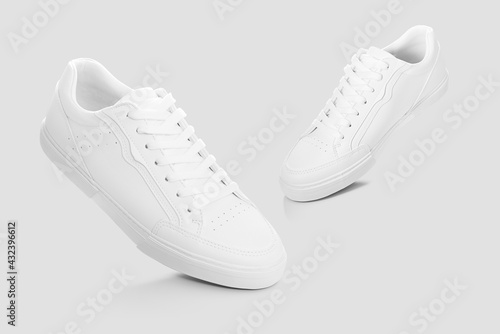 Mockup of a pair of sneakers isolated against plain background