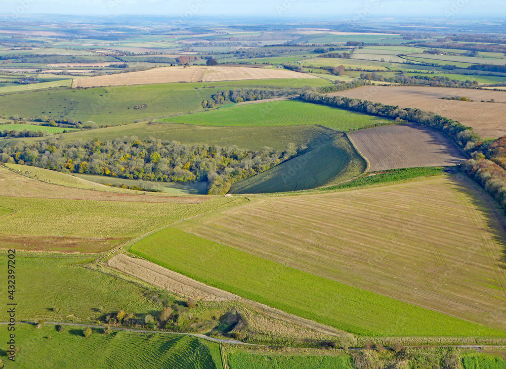 Paragliding above the fields at Monks Down in Wiltshire
