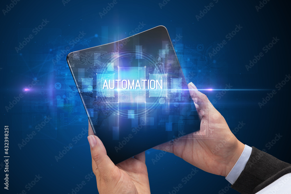 Businessman holding a foldable smartphone Businessman holding a foldable smartphone
