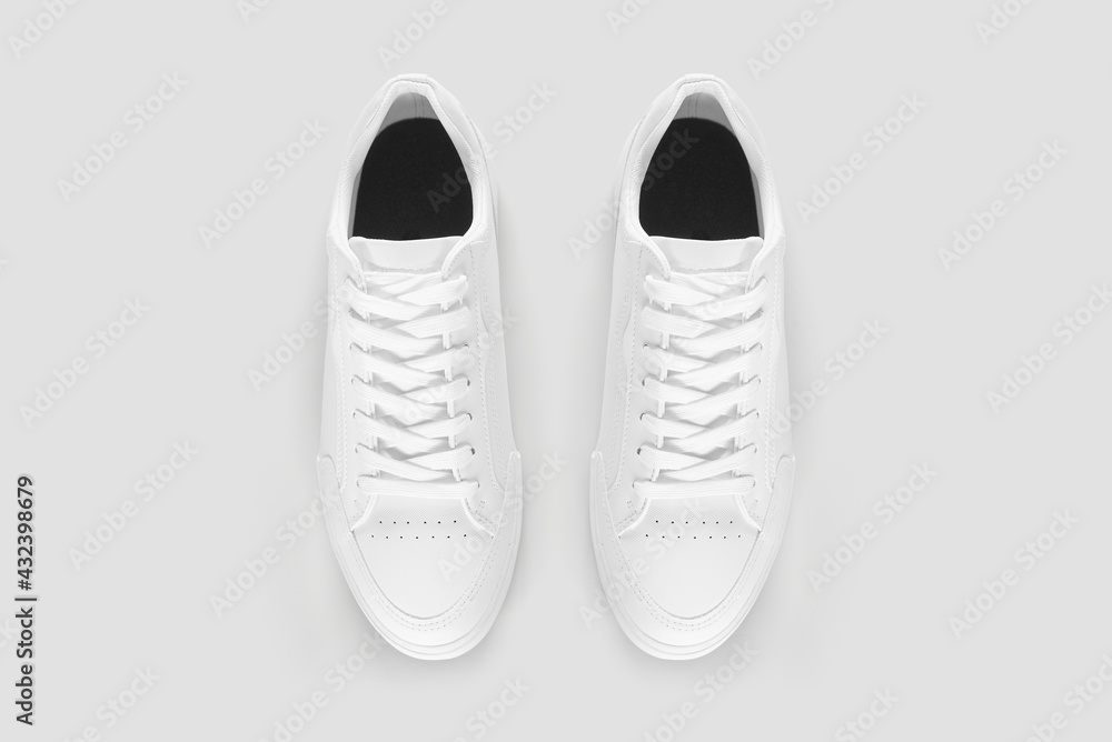 Mockup of a pair of sneakers from above Mockup of a pair of sneakers from above