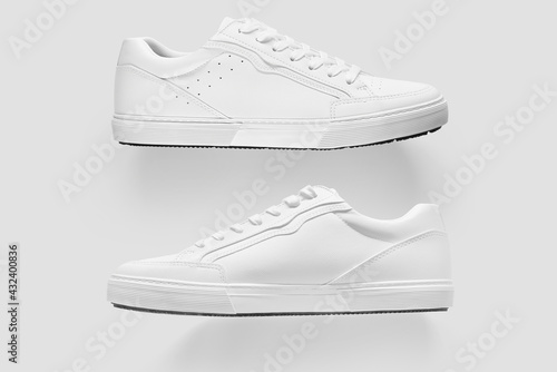 Mockup of the two sides of white generic sneakers photo