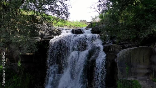 Salabrone waterfalls in Farnese (VT).
Aerial shot of the waterfalls and the pond immersed in the thick veggetation. photo