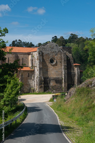 The monastery of San Lorenzo de Carboeiro is a former Benedictine monastery currently abandoned and under restoration, located on the banks of the Deza river. Silleda, Galicia, Spain photo