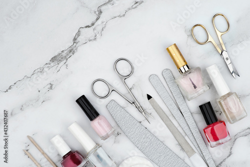 Manicure and pedicure flatlay concept, cosmetic accessories