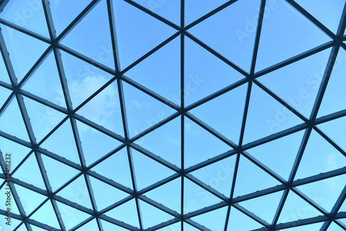 Modern glass roof and sky.
