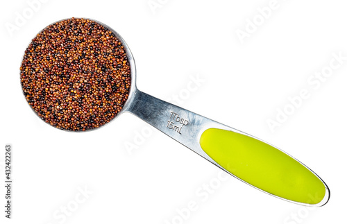 top view canihua seeds in measuring spoon cutout photo