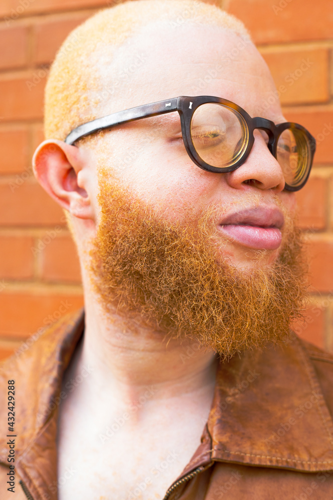 Man with orange beards with eyes half closed. Man with orange beards with eyes half closed.