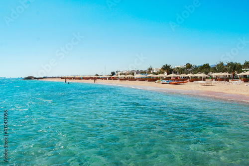 Fototapeta Naklejka Na Ścianę i Meble -  Egypt, Safaga, Red Sea coast, waves, blue lagoon, white sand, sunny day, vacation by the sea.