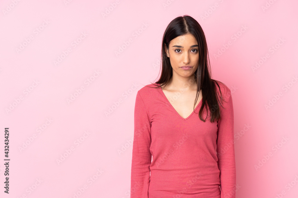 Young caucasian woman over isolated background with sad expression Young caucasian woman over isolated background with sad expression