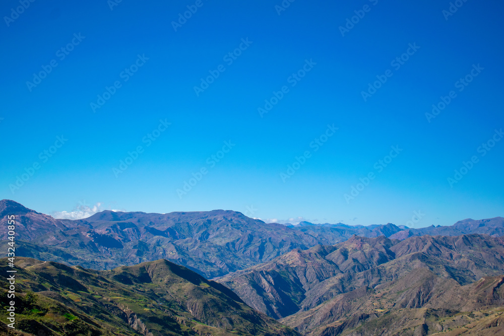 Naklejka premium mountains and clouds
