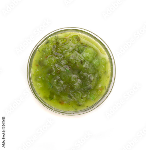 bowl with relish sauce on white background