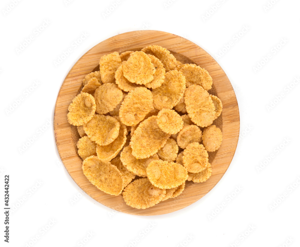 plate with cornflakes on a white background