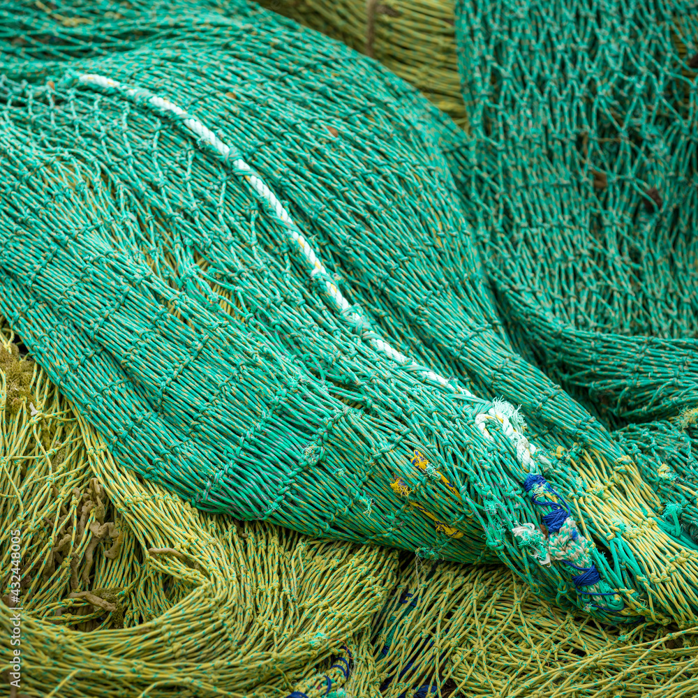 Trawl net stacked on wharf