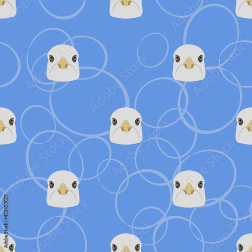 Seamless animal pattern with funny heads of seagulls or gulls and abstract ellipses.