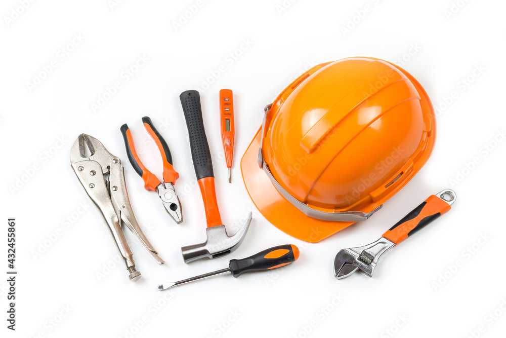 Helmet Safety Hand tools, Work Gloves and Hammer, isolated on white background, Yellow safety helmet for construction and tools on white background. Helmet Safety Hand tools, Work Gloves and Hammer, isolated on white background, Yellow safety helmet for construction and tools on white background.