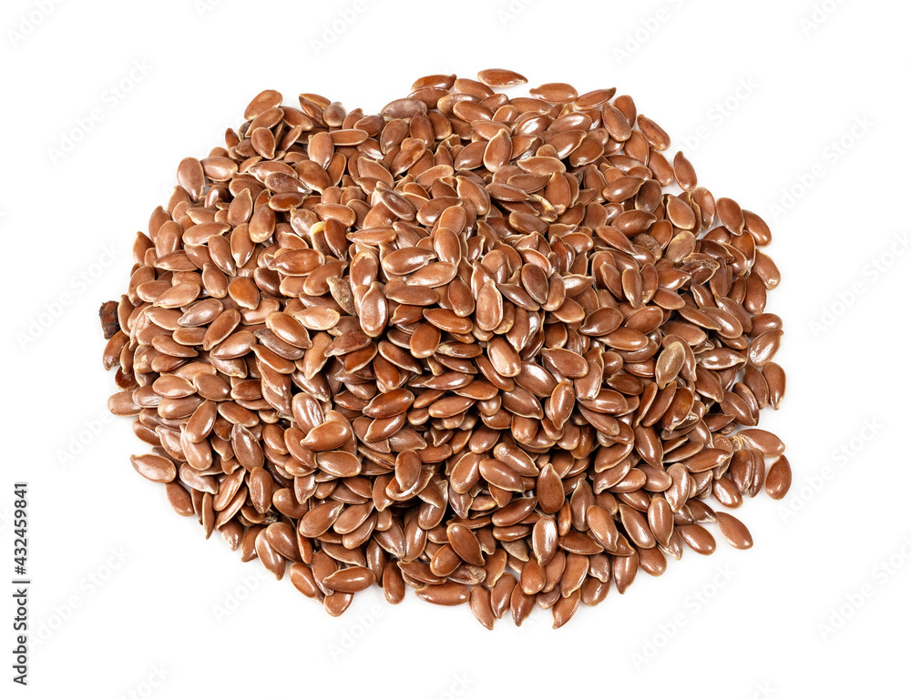 pile of brown flax seeds closeup on white pile of brown flax seeds closeup on white