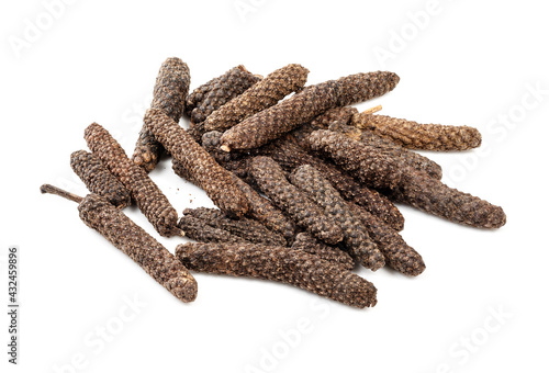 handful of long pepper catkins closeup on white photo