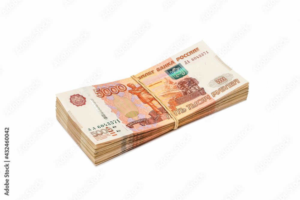 Pack of five thousandth ruble bills fastened with an elastic band isolated on a white background Pack of five thousandth ruble bills fastened with an elastic band isolated on a white background