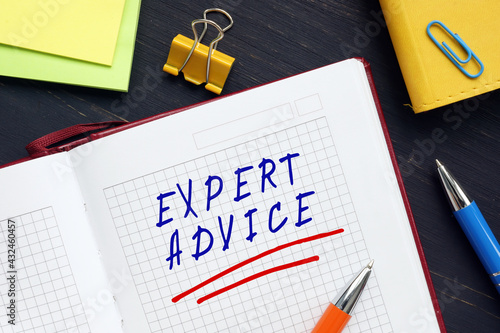 Business concept meaning EXPERT ADVICE with inscription on the sheet. The definition of expert advice in the dictionary is advice given by someone who has studied a subject thoroughly