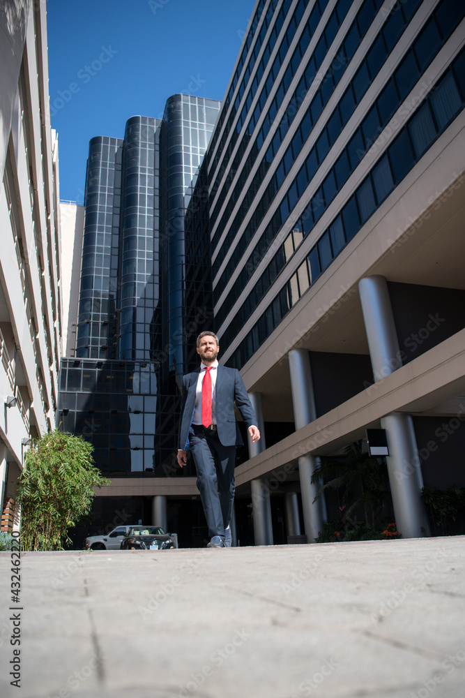 Manager in a luxury modern open space business center. Successful business man outside. Manager in a luxury modern open space business center. Successful business man outside.
