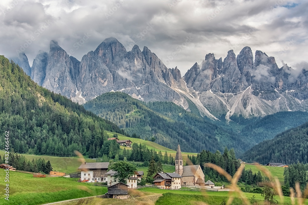 Santa Maddalena village with beautiful Dolomites mountains in the background, Val di Funes valley, Italy