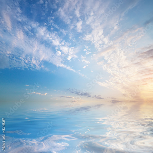 Sky background and water reflection.