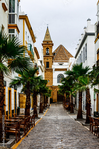 Bild auf Leinwand Street Virgen de la Palma with Church Nuestra Senora de la Palma