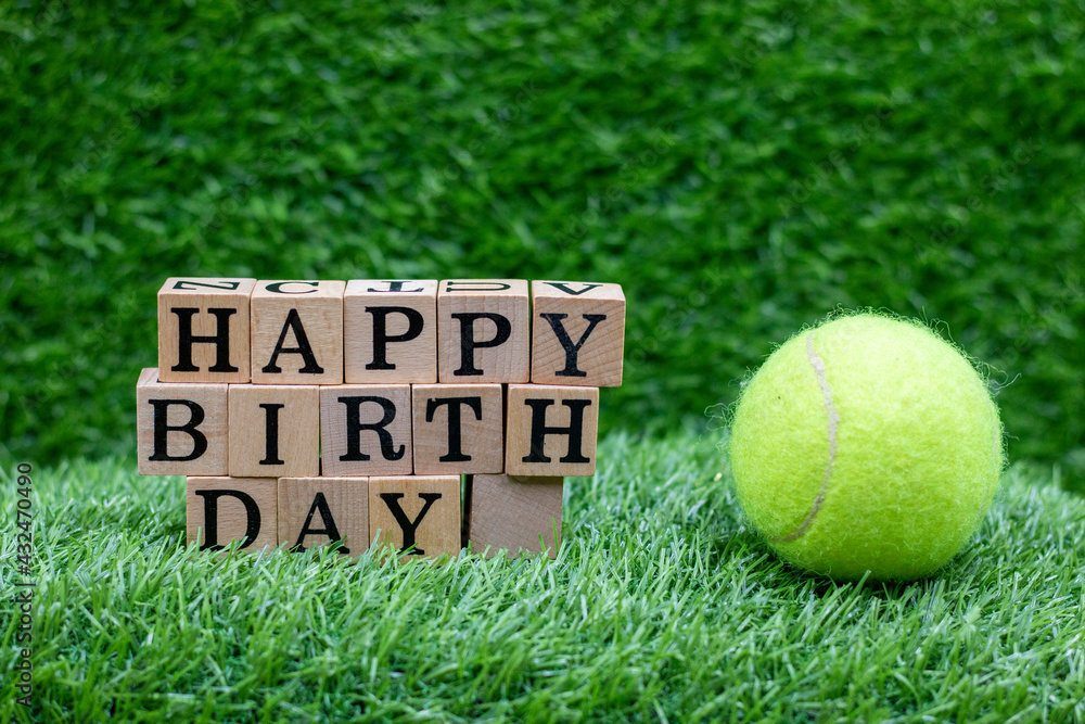 Tennis birthday with tennis ball and happy birthday are on green grass  background Stock Photo | Adobe Stock