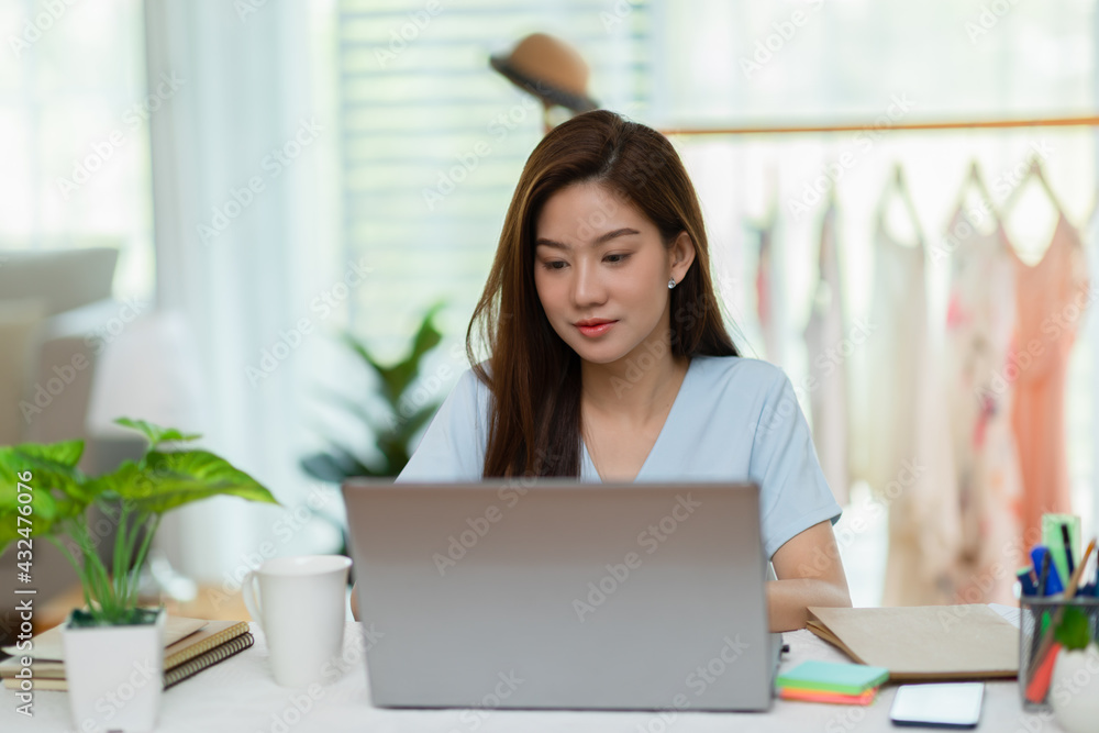 Entrepreneur of beautiful business asian young woman working online with laptop at home,Freelance woman working online sale marketing at home,Small Business Startup concept Entrepreneur of beautiful business asian young woman working online with laptop at home,Freelance woman working online sale marketing at home,Small Business Startup concept