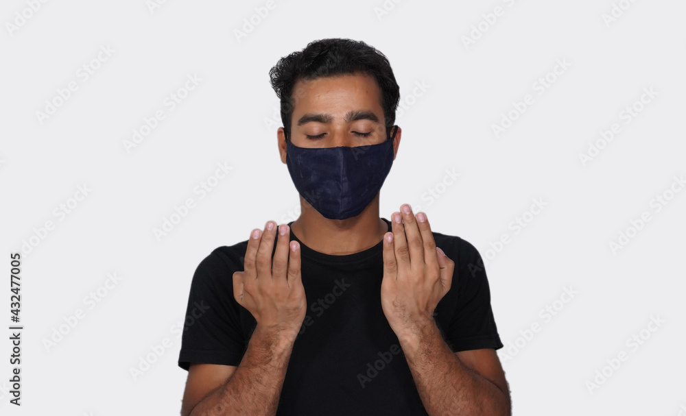 Muslim Man praying to allah weared mask Muslim Man praying to allah weared mask