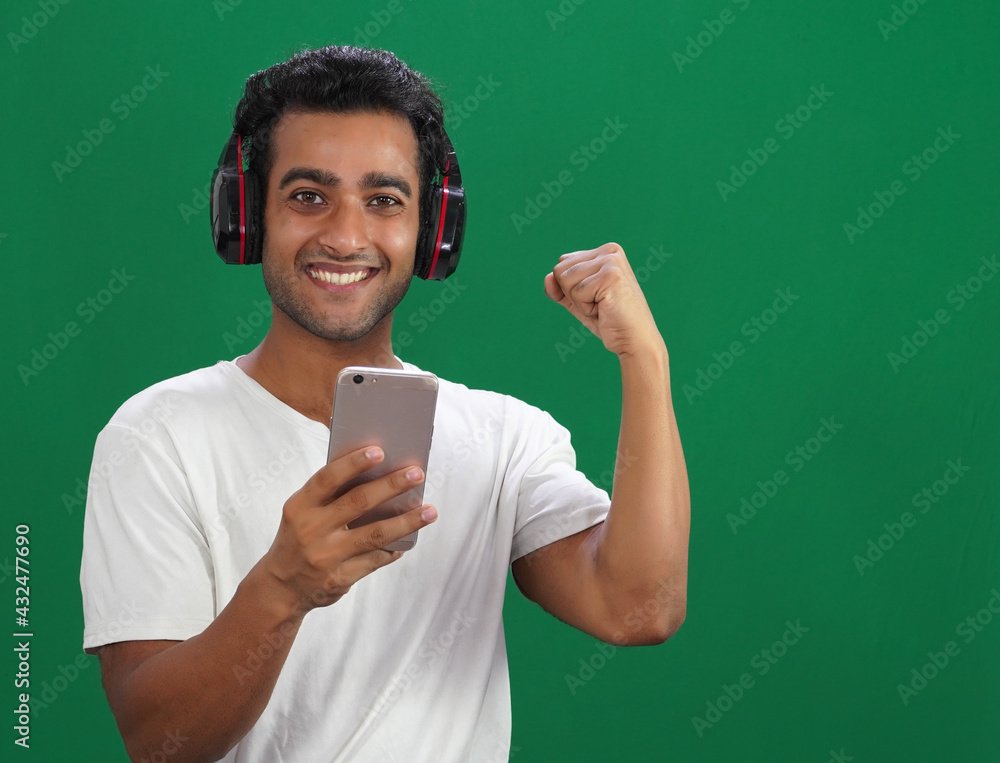 Portrait of a happy man celebrating success of his result Portrait of a happy man celebrating success of his result