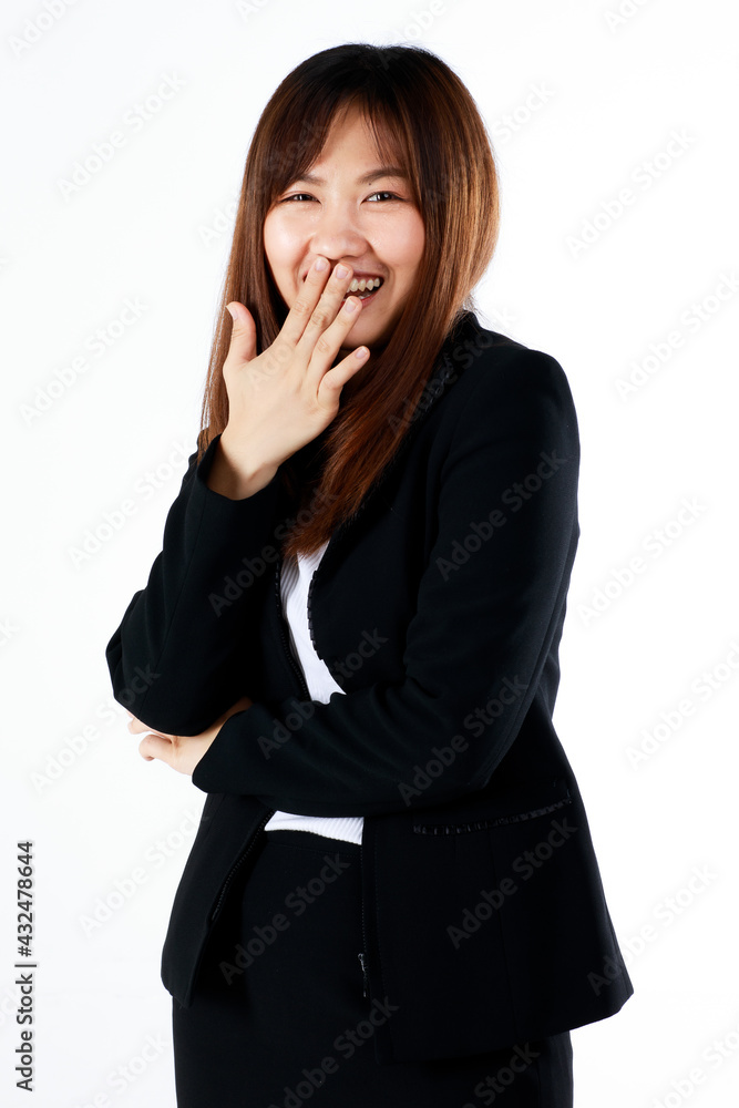 Young and fresh new graduated look Asian businesswoman in suit pose using hand cover mouth while laughing and feel humor on white background Young and fresh new graduated look Asian businesswoman in suit pose using hand cover mouth while laughing and feel humor on white background