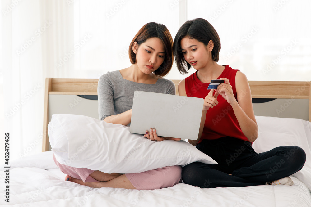 Couple Adults Pretty Lesbians Asian Women See At Her Laptop And Do Look Like Intention Smiling 