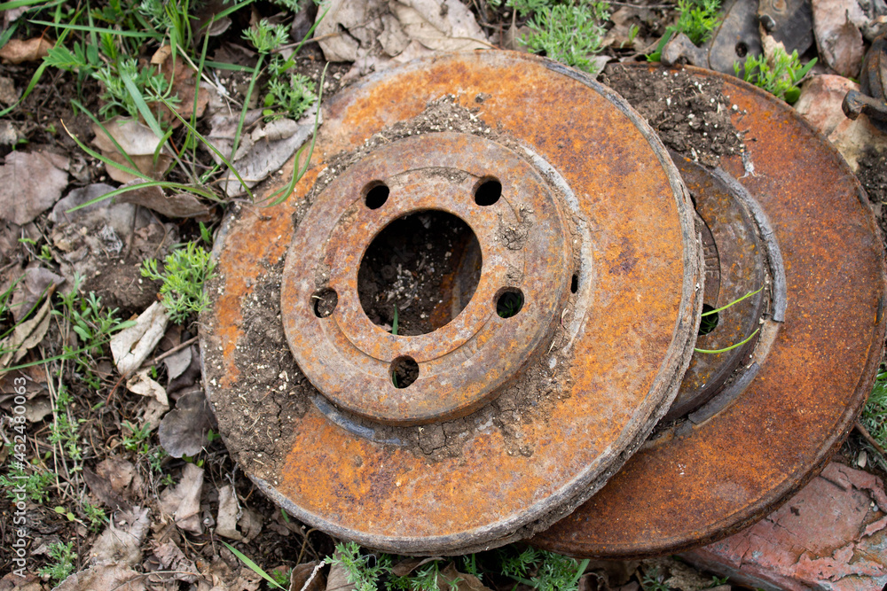 Rusty brake discs for cars. Old car parts.