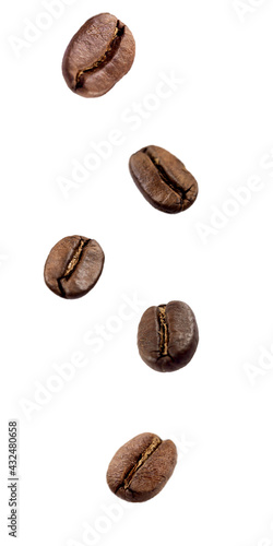 Coffee beans that are falling to the ground isolated on white background