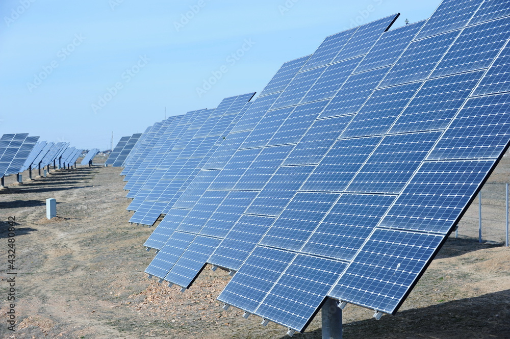 Almaty, Kazakhstan - 03.11.2016 : Solar panels of different sizes are lined up in a row to collect energy. Almaty, Kazakhstan - 03.11.2016 : Solar panels of different sizes are lined up in a row to collect energy.