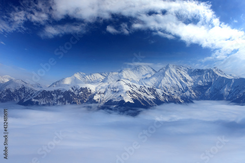 Scenic snowy mountains view, sunny