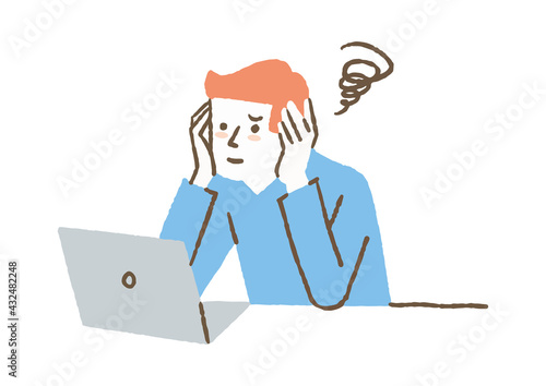 仕事中に悩んでいる男性