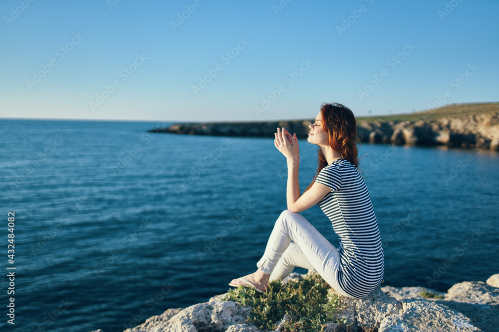 women in the mountains near the sea in nature adventure tourism model