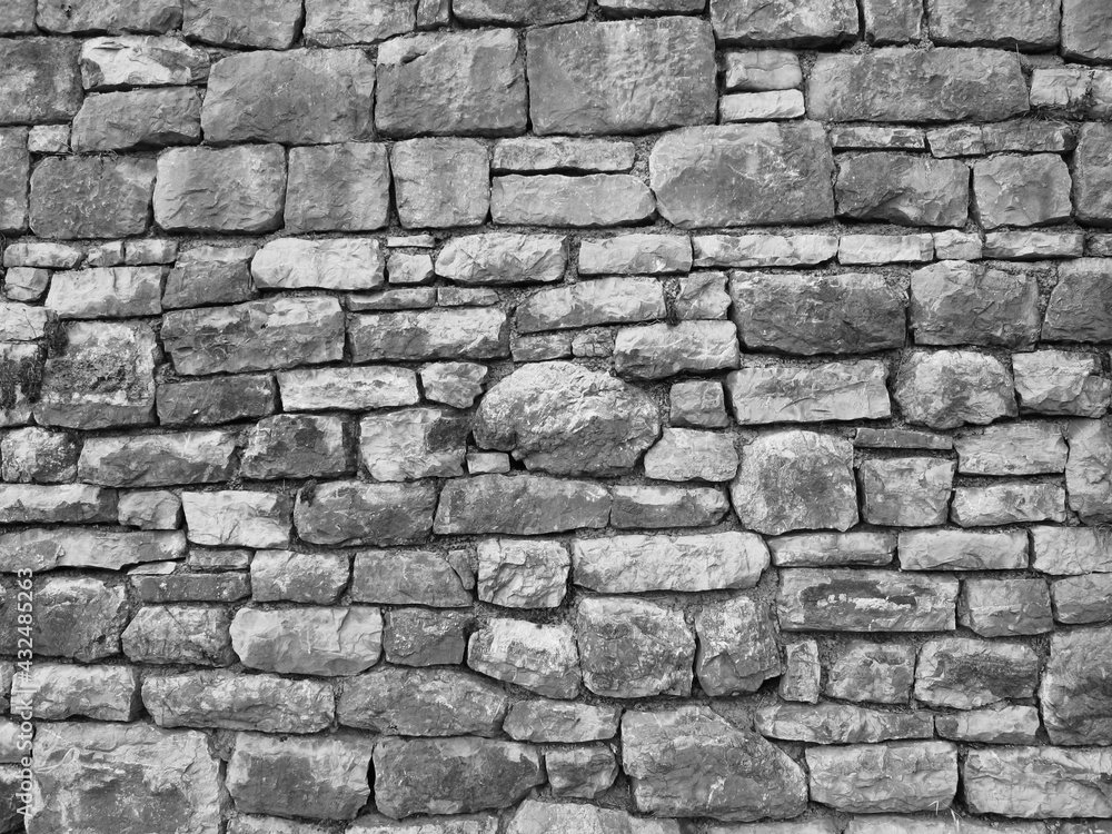 Fototapeta premium Stone Wall Castle Closeup. It is stone rough wall for pattern and background