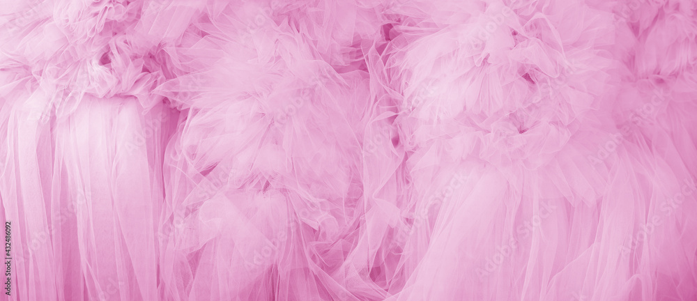 Beautiful folds of transparent pink fabric. Textile texture. Beautiful folds of transparent pink fabric. Textile texture.