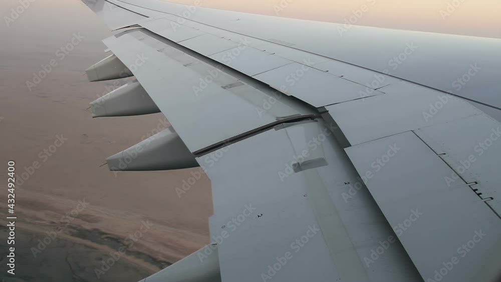 Aircraft wing, flap and aileron moving while the flight Aircraft wing, flap and aileron moving while the flight
